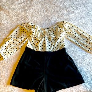 Used, like new, one piece short romper. Size XL